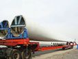 Mountain wind turbine blade transport vehicle